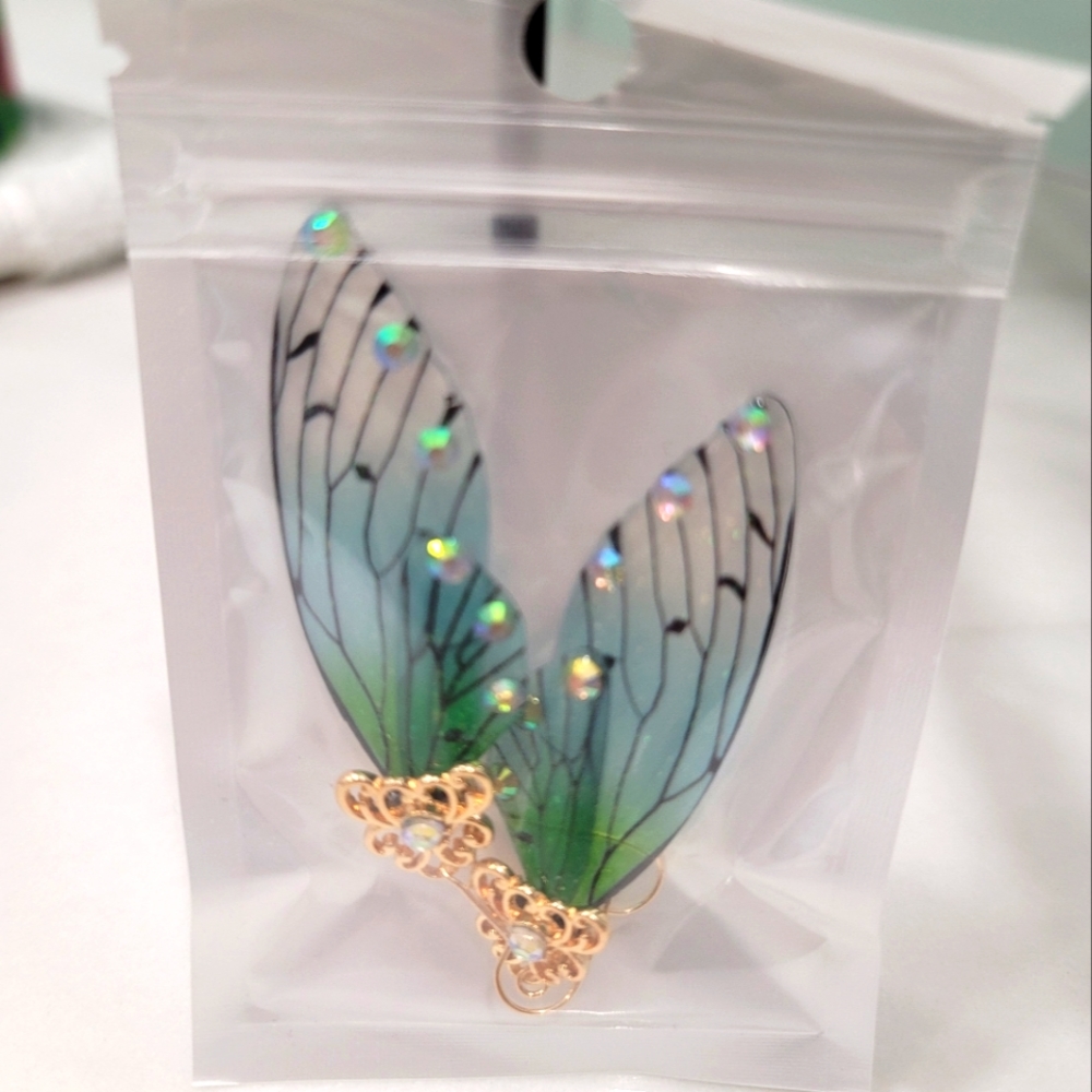 New angel wing earrings. 2.5” long